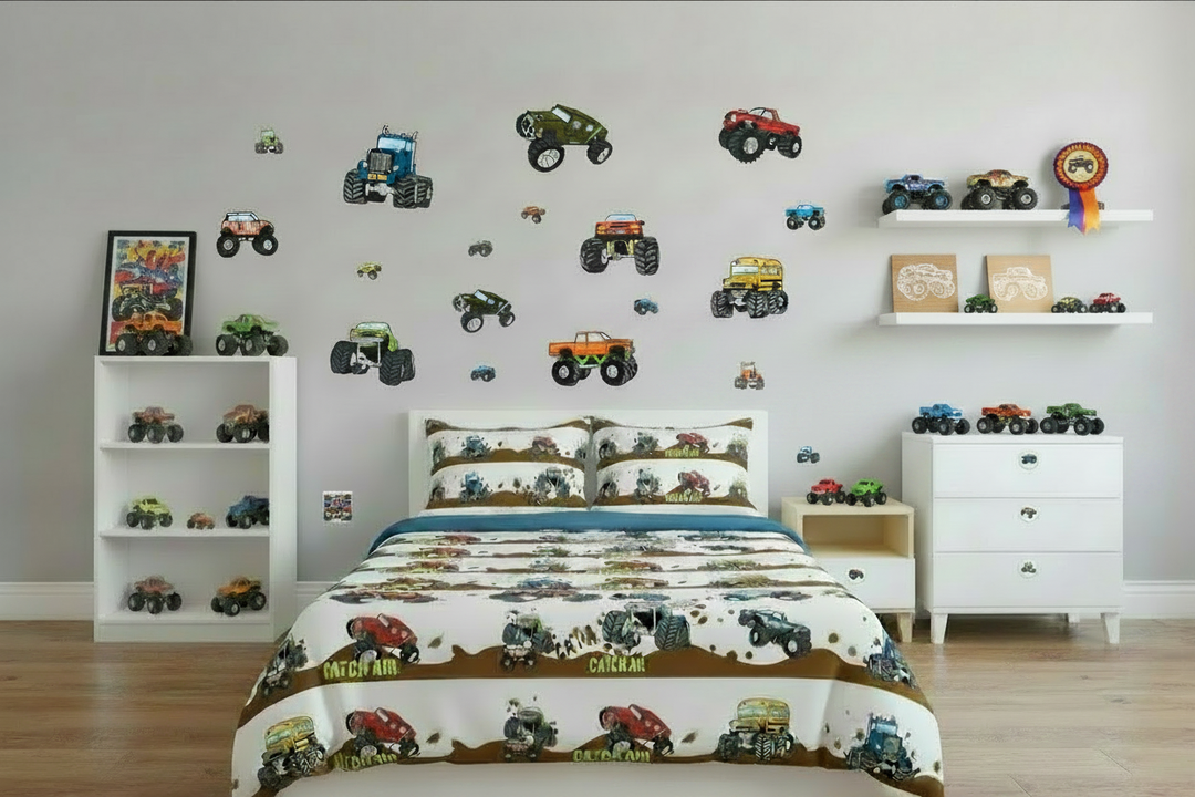 Complete monster truck boys bedroom decor collection — full room scene featuring monster truck wall decals, lamp shade, border, drawer knobs, switch plates, night light and wood art prints, Made in USA
