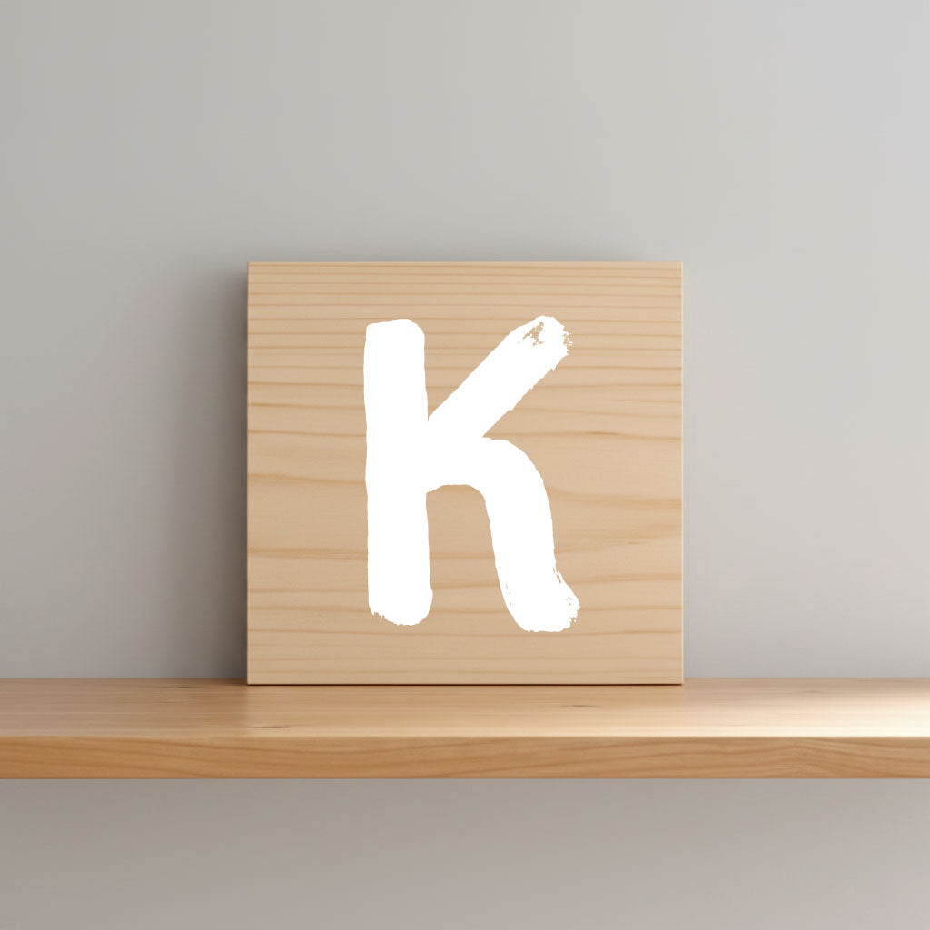 Rustic monogram letter K on natural distressed wood wall hanging, personalized nursery decor for shelf, dresser, and kids bedroom by Presto Chango Decor