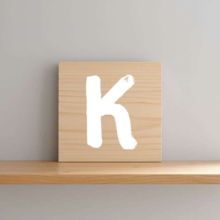 Rustic monogram letter K on natural distressed wood wall hanging, personalized nursery decor for shelf, dresser, and kids bedroom by Presto Chango Decor