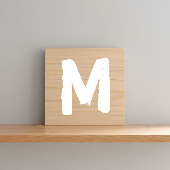Rustic monogram letter M on natural distressed wood wall hanging, personalized nursery decor for shelf, dresser, and kids bedroom by Presto Chango Decor