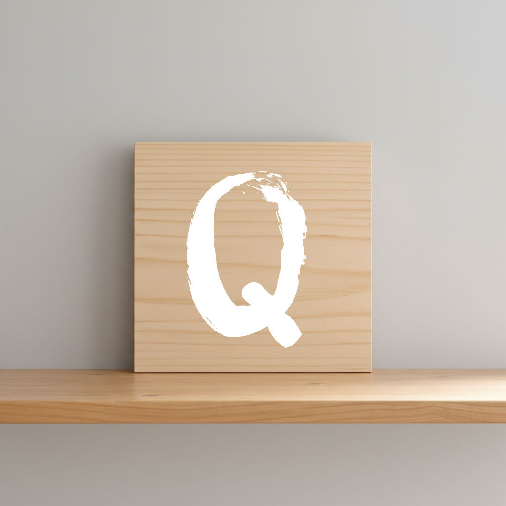 Rustic monogram letter Q on natural distressed wood wall hanging, personalized nursery decor for shelf, dresser, and kids bedroom by Presto Chango Decor
