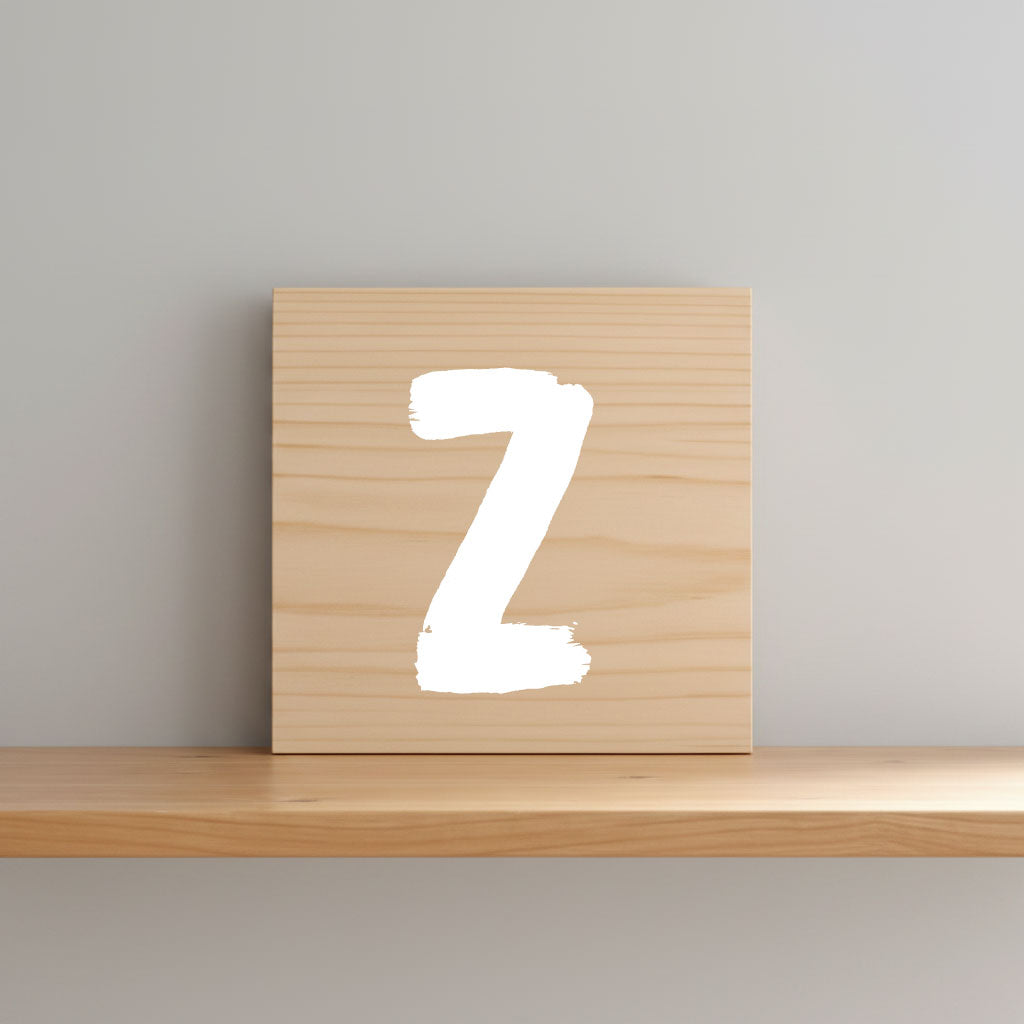 Rustic monogram letter Z on natural distressed wood wall hanging, personalized nursery decor for shelf, dresser, and kids bedroom by Presto Chango Decor
